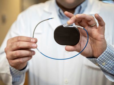 Man Holding Pacemaker