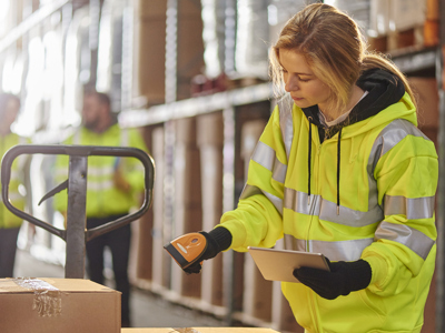 women packing box in warehouse