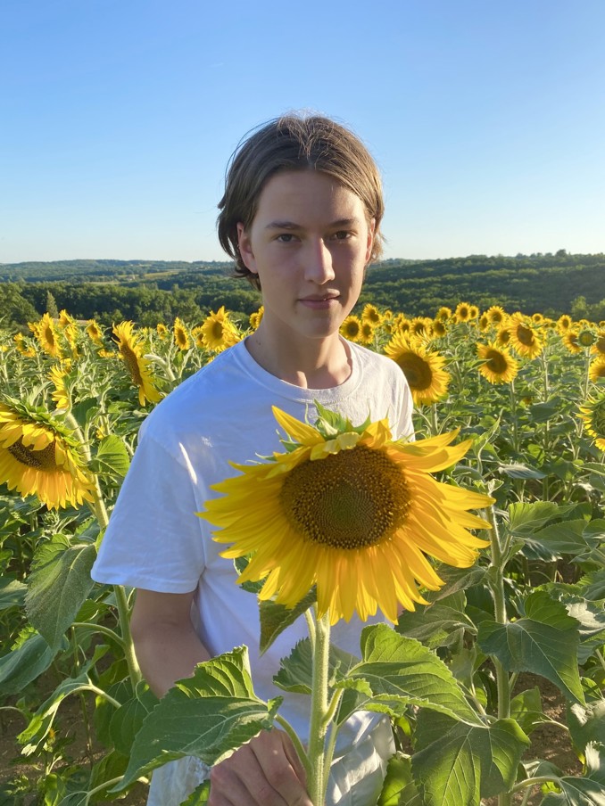 Arthur Soames, a young man in a sunflower field