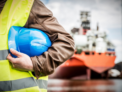 Man In Front Of Ship
