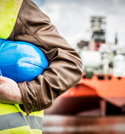 Man In Front Of Ship