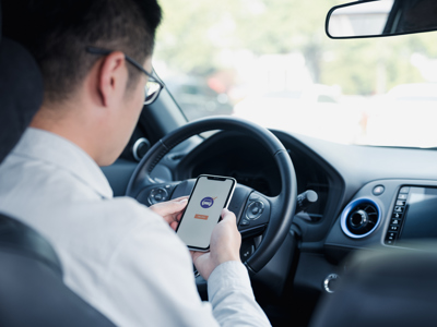 Taxi Driver At Wheel