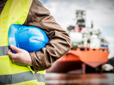 Man In Front Of Ship