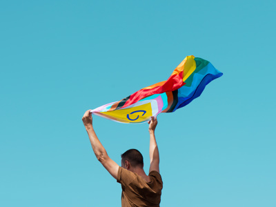 Person holding pride flag