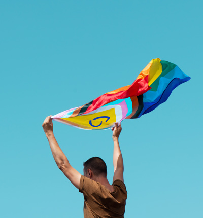 Person holding pride flag
