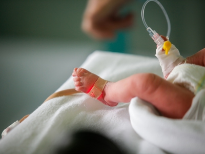 Baby With Drip In Foot