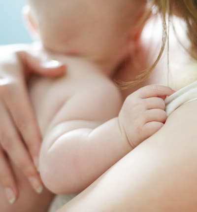 Newborn baby and mother