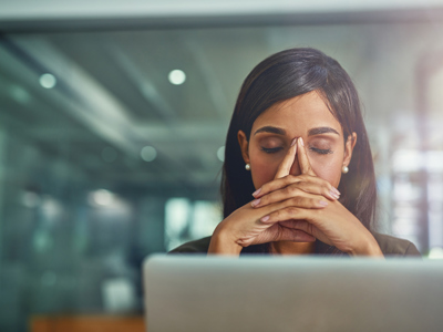 flipped image - drained women at work on computer 660768852