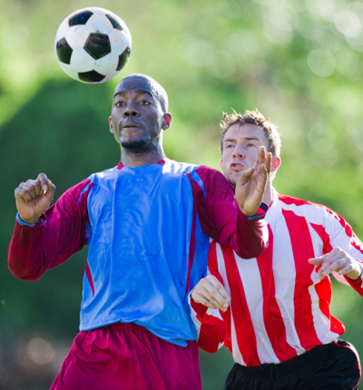 Footballer Heading Ball