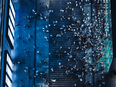 Crowded People Walking On The Street At Night Stock Photo