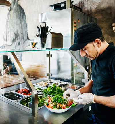 Chef preparing a salad