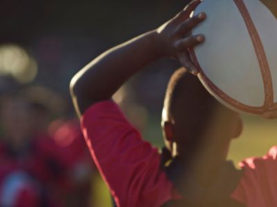 Rugby Player Throwing Ball (1)
