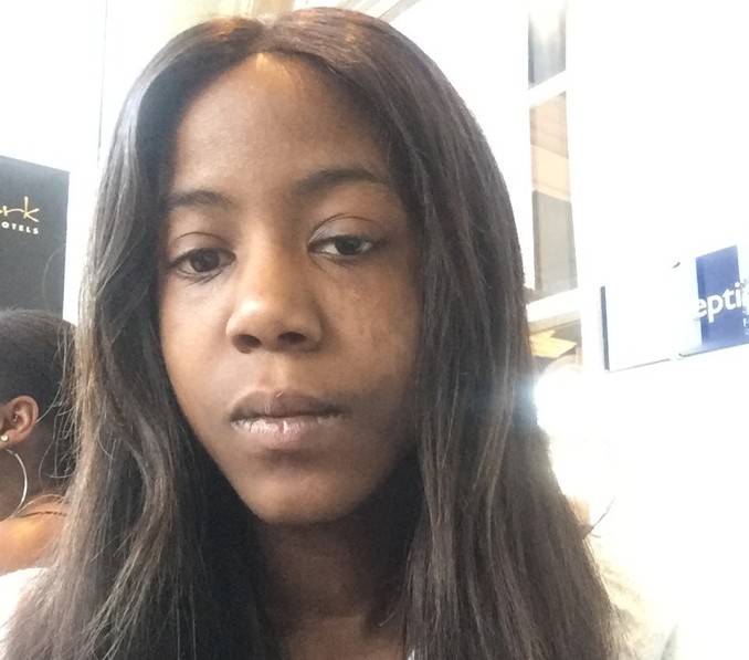 A selfie of Charlotte Lindsay, a black woman with brown hair