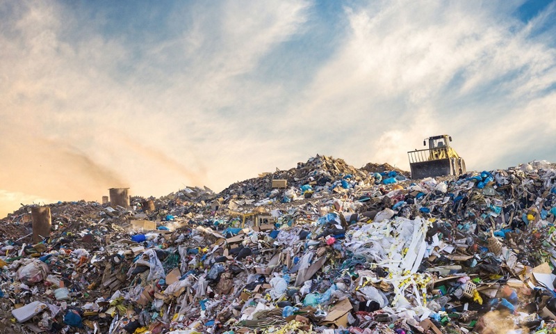 Rubbish Dump With Bulldozer