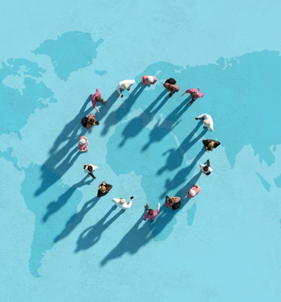 Bright blue map and people standing in a circle