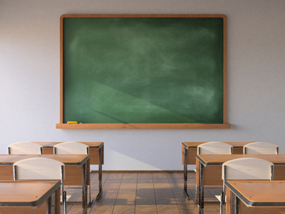 An empty classroom with a blank blackboard, chairs and tables