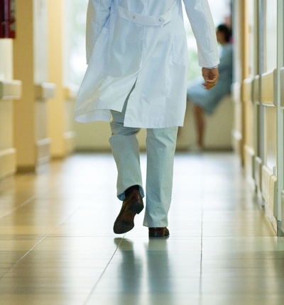 Doctor Walking Down Corridor