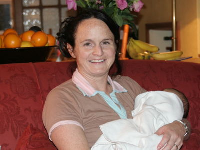 Samantha young holding a baby