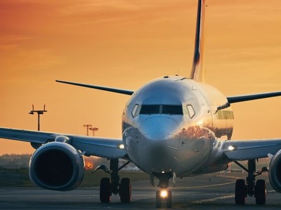 Airplane With Orange Sky