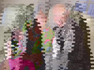 Keith With His Wife Kathleen And Grandchild