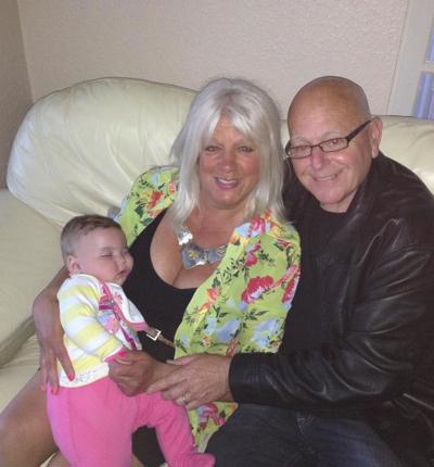 Keith With His Wife Kathleen And Grandchild