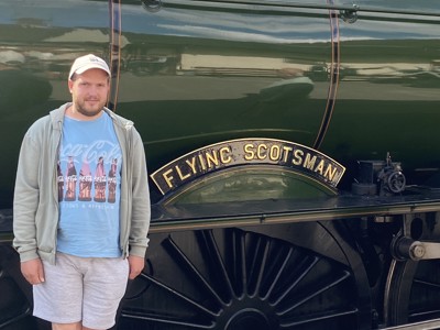 Tom Next To Flying Scotsman Train