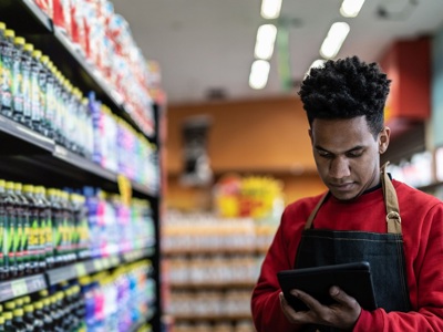 Young Black Supermarket Worker