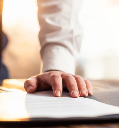 Man Signing A Document