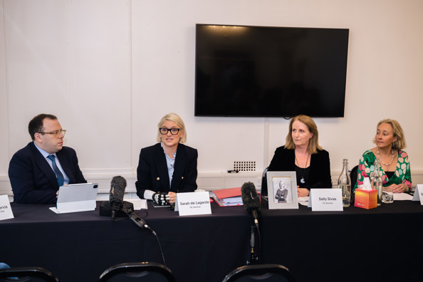 Thomas Jervis, Sarah de Lagarde, Sally Sivas and Sarah Hope seated at a press conference table