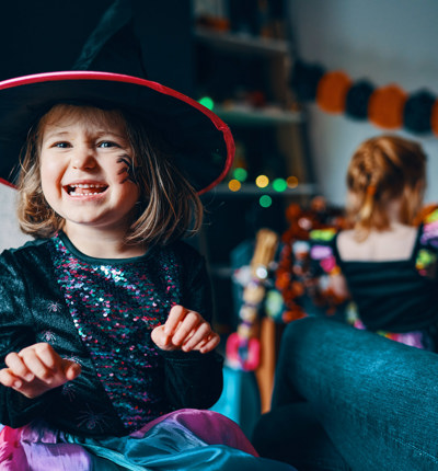 kid in halloween costume