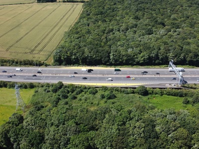 UK Motorway Traffic In Trees