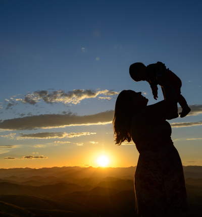 mother holding baby