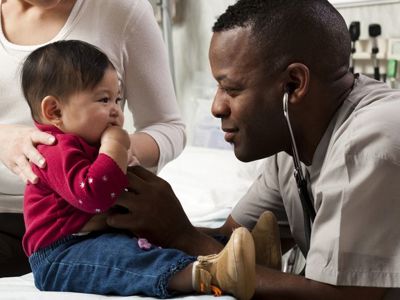 Young Child And Doctor