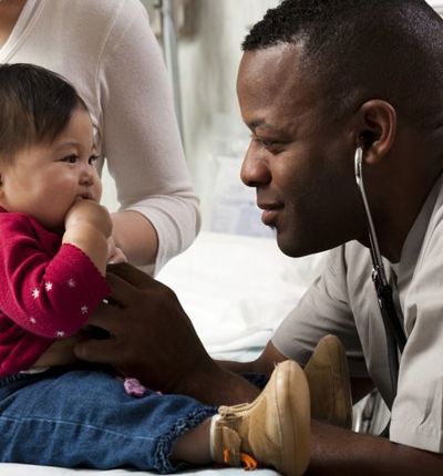 Young Child And Doctor