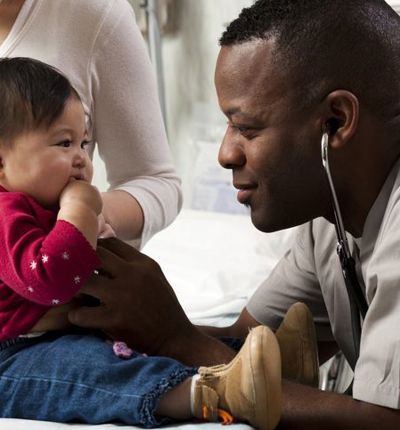 Young Child And Doctor