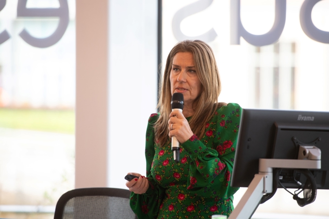 Suzanne White speaking at Woman of the North event