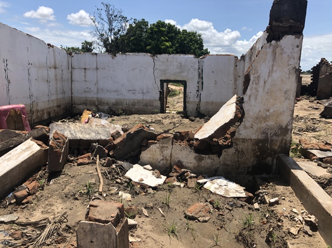 A Kanseche villager's destroyed home