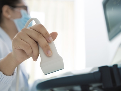 Close up of a doctor completing an ultrasound