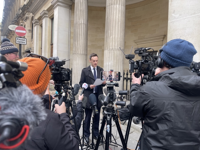 Andrew Lord, lawyer giving a speech to journalists outside of court