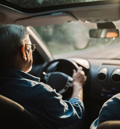 Middle aged man driving