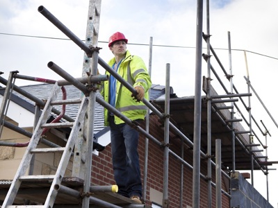 Construction Worker On Roof