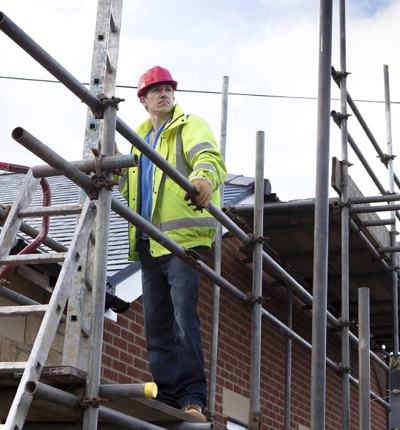 Construction Worker On Roof