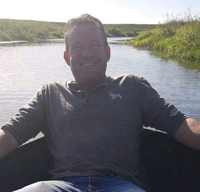 David Daly sitting on a boat.