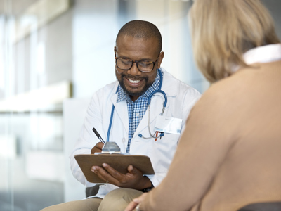 Patient Talking To Doctor