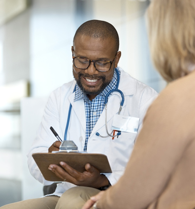 Patient Talking To Doctor
