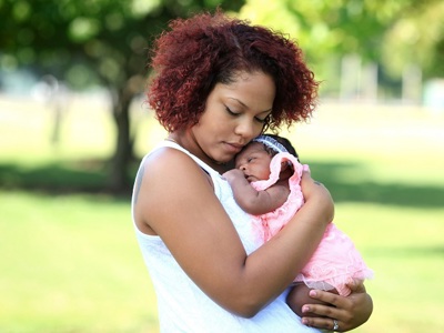 Young Mother And Baby