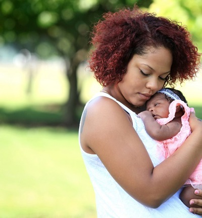 Young Mother And Baby