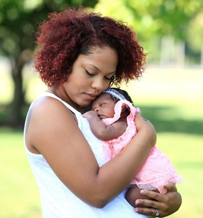 Young Mother And Baby