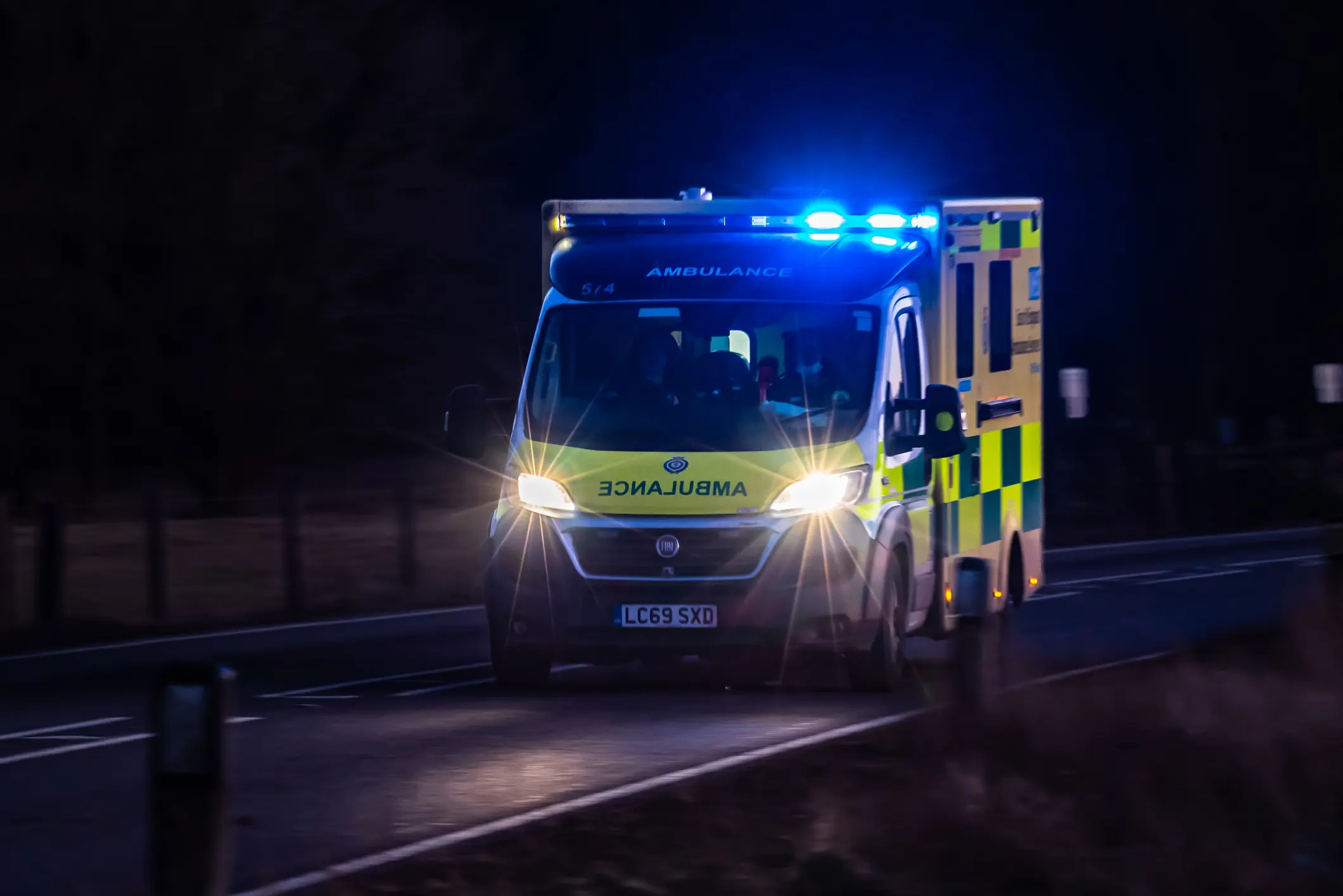 British ambulance responding to a medical emergency on blue light
