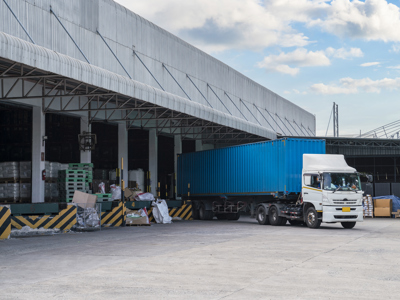A lorry at a warehouse